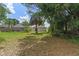 Expansive backyard with lush greenery, shade trees, and privacy at 369 Placid Lake Dr, Sanford, FL 32773