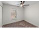 Bedroom with ceiling fan, neutral carpet, window, and closet at 369 Placid Lake Dr, Sanford, FL 32773