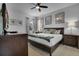 This bedroom features a ceiling fan, decorations, and furnishings, perfect for a relaxing retreat at 381 Cabello Dr, Davenport, FL 33837
