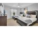This bedroom features two beds and ample natural light, creating a comfortable and inviting atmosphere at 381 Cabello Dr, Davenport, FL 33837