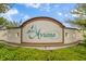The Aviana community sign is surrounded by lush landscaping and greenery at 381 Cabello Dr, Davenport, FL 33837