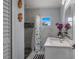Cozy bathroom features updated vanity and decorative accents at 40140 Swift Rd, Eustis, FL 32736