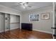 Bedroom featuring a ceiling fan, and a view from the window at 40140 Swift Rd, Eustis, FL 32736