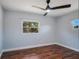 Bedroom with wood-look floors and natural light at 40140 Swift Rd, Eustis, FL 32736