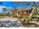 Charming home featuring a covered porch and inviting curb appeal at 40140 Swift Rd, Eustis, FL 32736