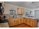 The kitchen includes granite countertops, modern appliances, and a breakfast bar at 40140 Swift Rd, Eustis, FL 32736