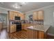 Updated kitchen features granite countertops, modern appliances, and ample cabinet space at 40140 Swift Rd, Eustis, FL 32736