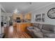 Living room open to kitchen featuring modern decor and plenty of space at 40140 Swift Rd, Eustis, FL 32736