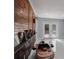Bright living room with decorative wood wall feature and white tile floors at 40140 Swift Rd, Eustis, FL 32736