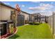 Well maintained backyard, featuring artificial turf, a trampoline and a shed for extra storage at 5182 Appenine E Loop, St Cloud, FL 34771