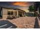 Wide backyard view featuring a patio and outdoor seating arrangement at 5182 Appenine E Loop, St Cloud, FL 34771