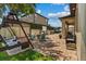 Backyard view featuring an outdoor fire pit and swing set at 5182 Appenine E Loop, St Cloud, FL 34771