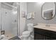 Clean bathroom with a glass enclosed shower and neutral colors at 5182 Appenine E Loop, St Cloud, FL 34771