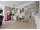 Stylish living area with a vintage gas pump decor, bar area, and an open view into the entry at 5182 Appenine E Loop, St Cloud, FL 34771