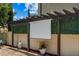 Enjoy outdoor entertainment with a large projector screen on a pergola in the backyard at 5182 Appenine E Loop, St Cloud, FL 34771