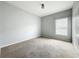 Cozy bedroom with a window for natural light and a closet for storage at 5431 Lochdale Dr, Orlando, FL 32818