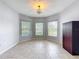 Sunny breakfast nook with large windows and tile floors, perfect for enjoying morning coffee at 5431 Lochdale Dr, Orlando, FL 32818