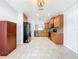 Spacious kitchen with tile floors, stainless steel appliances, and ample counter space for meal preparation at 5431 Lochdale Dr, Orlando, FL 32818