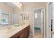 Bathroom featuring double sinks and separate toilet/shower area at 600 Egret Place Dr, Winter Garden, FL 34787