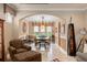Formal dining area with modern lighting fixture and neutral colors at 600 Egret Place Dr, Winter Garden, FL 34787
