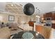 View of the living space with stylish furnishings, open layout, and modern kitchen featuring stainless steel appliances at 600 Egret Place Dr, Winter Garden, FL 34787