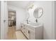 Bathroom boasts double sinks, modern fixtures, and a spacious walk-in closet at 8735 Rancho Ct, Orlando, FL 32836