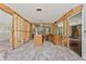 Spacious area featuring exposed framing, showcasing potential for kitchen renovation at 8735 Rancho Ct, Orlando, FL 32836