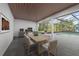 Outdoor dining area overlooking pool at 8735 Rancho Ct, Orlando, FL 32836