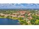 Aerial view of the Visconti condominium community with pool, landscaping and lakeside view at 1125 Lake Shadow Cir # 5109, Maitland, FL 32751