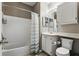 Clean bathroom with tub and shower, vanity with sink, and wood-look floors at 1125 Lake Shadow Cir # 5109, Maitland, FL 32751