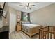 Inviting bedroom features wood-look floors, neutral paint and a cozy atmosphere at 1125 Lake Shadow Cir # 5109, Maitland, FL 32751