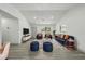 Stylish living room features modern furniture, a cozy rug, and plenty of natural light at 11540 Harbor Rd, Leesburg, FL 34788