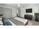 Spacious main bedroom with wood-look floors and large closet at 11540 Harbor Rd, Leesburg, FL 34788