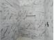 Close-up of a shower featuring white marble-style tiling and a built-in soap niche at 11540 Harbor Rd, Leesburg, FL 34788
