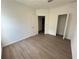 Spacious bedroom with hardwood floors and plenty of space, with natural light at 1205 Southstation Pl # 208, Orlando, FL 32809