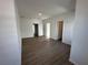This bedroom has a great open floorplan and hardwood floors at 1205 Southstation Pl # 208, Orlando, FL 32809