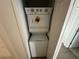 A close up shot of a Whirlpool stacked washer and dryer at 1205 Southstation Pl # 208, Orlando, FL 32809
