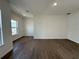 Bright living room features new floors and lots of natural light at 1205 Southstation Pl # 208, Orlando, FL 32809