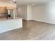 Open living space showcasing luxury vinyl plank flooring and an open concept layout at 1205 Southstation Pl # 208, Orlando, FL 32809