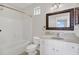 Bathroom featuring a bathtub, toilet, vanity, mirror, and overhead lighting at 12414 Baleria Cv # 104, Orlando, FL 32837
