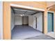 A well-lit and spacious garage with ample room for parking and storage, providing convenience and security at 12414 Baleria Cv # 104, Orlando, FL 32837