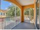 An inviting screened patio offering a relaxing outdoor space with views of the surrounding neighborhood at 12414 Baleria Cv # 104, Orlando, FL 32837