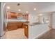 Kitchen with stone countertops, stainless appliances, and breakfast bar at 1307 Pup Fish Ln, Deland, FL 32724