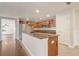 Kitchen showcasing cabinets, stainless appliances, and breakfast bar at 1307 Pup Fish Ln, Deland, FL 32724