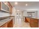 Kitchen featuring stone countertops and stainless appliances at 1307 Pup Fish Ln, Deland, FL 32724