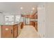 Kitchen showcasing stainless appliances and wooden cabinets at 1307 Pup Fish Ln, Deland, FL 32724
