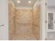 Shower featuring ceramic tile surround, accessible grab bars and adjustable shower head at 1307 Pup Fish Ln, Deland, FL 32724
