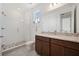 Bathroom featuring a glass enclosed shower, and a vanity with granite countertop at 13208 Leggett Aly, Orlando, FL 32827