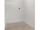A simple carpeted closet with shelf for optimal storage solutions at 13208 Leggett Aly, Orlando, FL 32827
