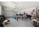 Spacious garage with epoxy flooring and ample space for parking and storage at 13208 Leggett Aly, Orlando, FL 32827